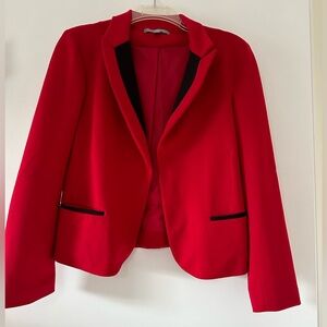 Red blazer with black accents.